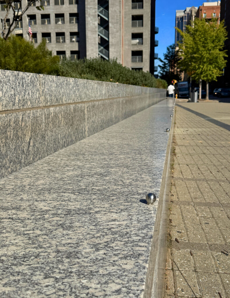 Seatwall in Raleigh, NC fabricated using honed Greene County granite, also known as Oconee Granite. This granite is ideal for large-scale construction projects due to its appearance and durability.